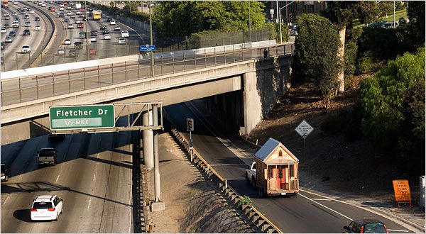 LITTLE HOUSE ON THE FREEWAY Jay Shafer took his 90-square-foot house on tour this summer, rolling along a Los Angeles highway.